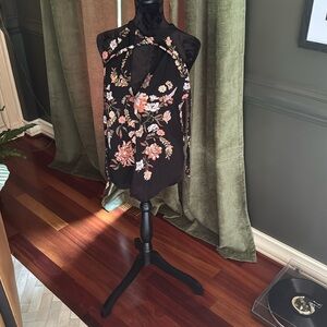 Black “Three People” top with flower design size medium